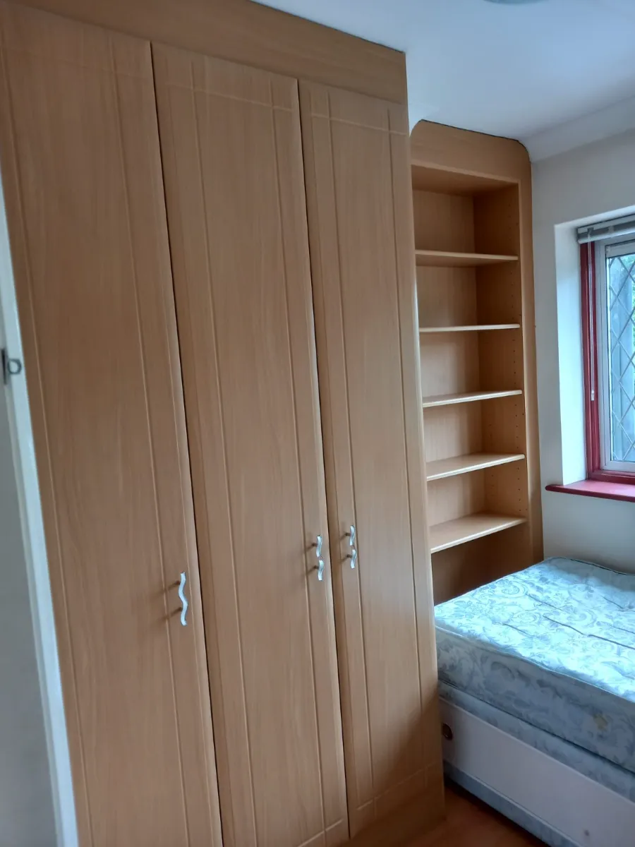 Bedroom wardrobe and shelves dusted