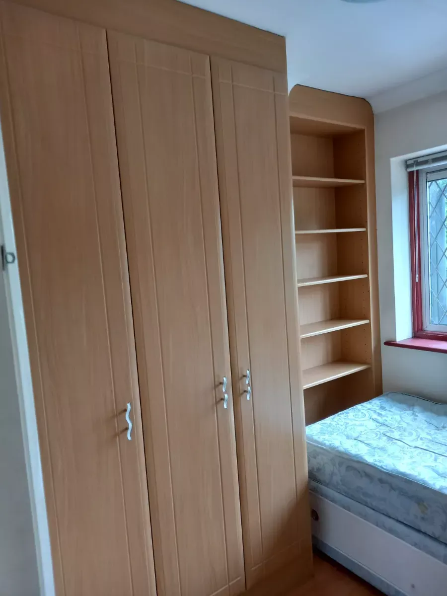 Bedroom wardrobe and shelves dusted