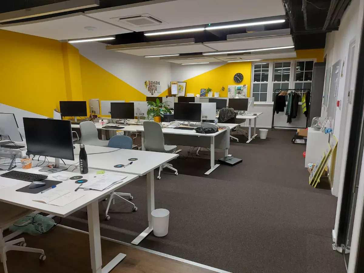 Desks wiped and carpet vacuumed