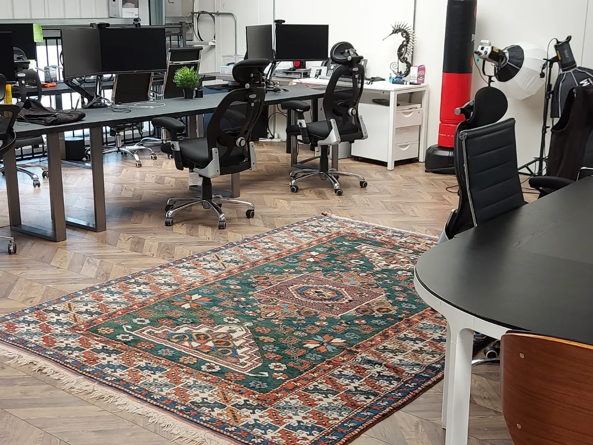 Rug and herringbone floors vacuumed